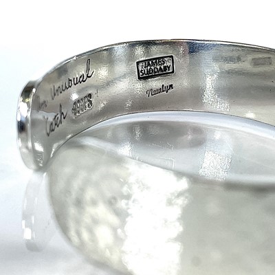 Lot 288 - A 999 fine silver bangle by James Suddaby,...