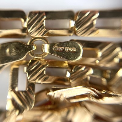 Lot 28 - An 18ct gold fancy rectangular link necklace,...