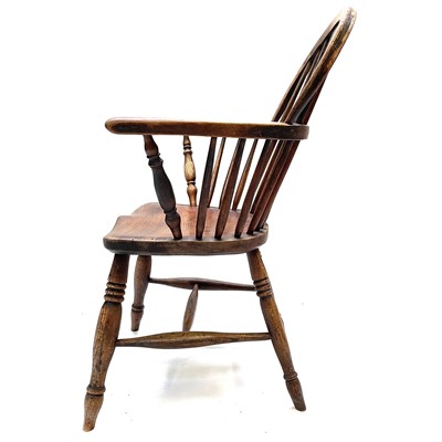 Lot 60 - An ash, elm and beech windsor armchair, 19th century.