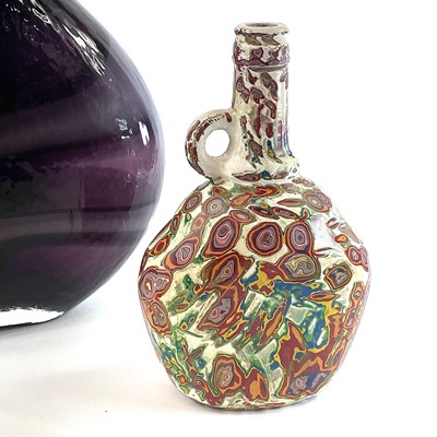 Lot 827 - An art glass vase, the amethyst ground with...