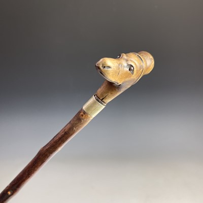 Lot 245 - A treen topped walking cane, late 19th century,...
