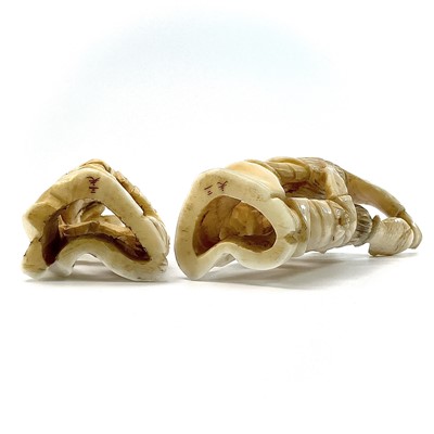Lot 253 - A pair of Japanese Meiji period carved ivory...
