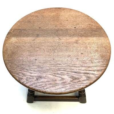 Lot 61 - An oak circular low table, circa 1920's.