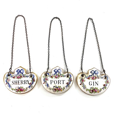 Lot 851 - A set of three Crown Staffordshire decanter...