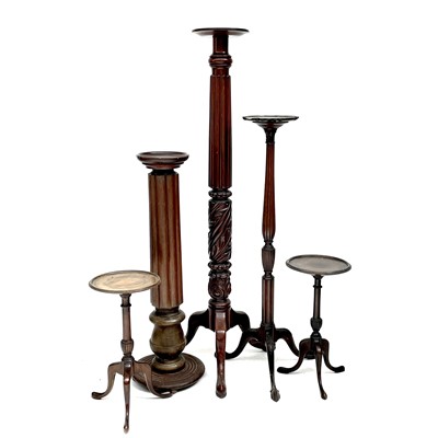 Lot 1912 - A Victorian Mahogany torchere, with fluted and...