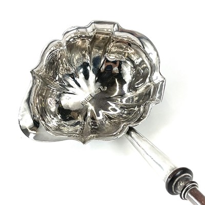 Lot 88 - A George II silver punch ladle, possibly by...