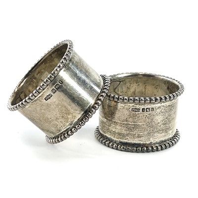 Lot 4 - A pair of Victorian heavy silver napkin rings...