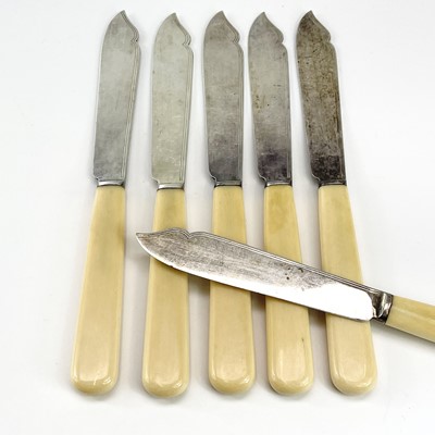 Lot 28 - An Edwardian silver and ivory fish knife and...