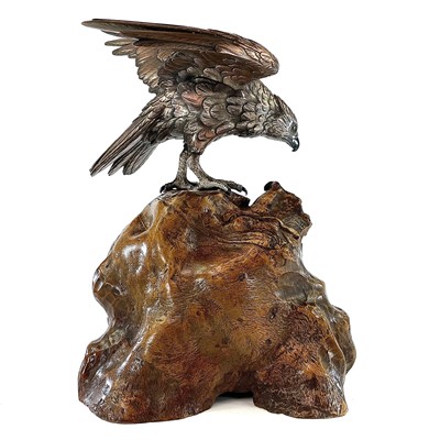 Lot 24 - A Japanese silvered bronze Okimono of a hawk...