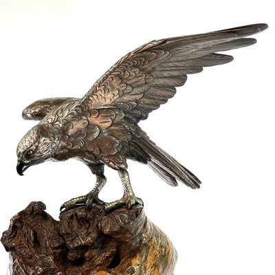 Lot 24 - A Japanese silvered bronze Okimono of a hawk...