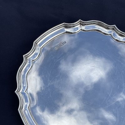Lot 154 - A modern silver salver by Poston Products Ltd,...