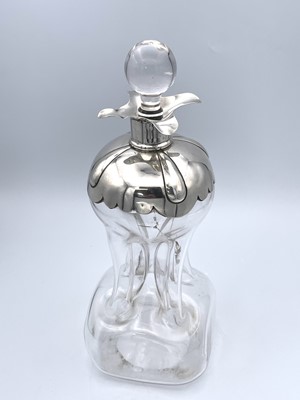 Lot 16 - An Edwardian silver mounted pinched glass...