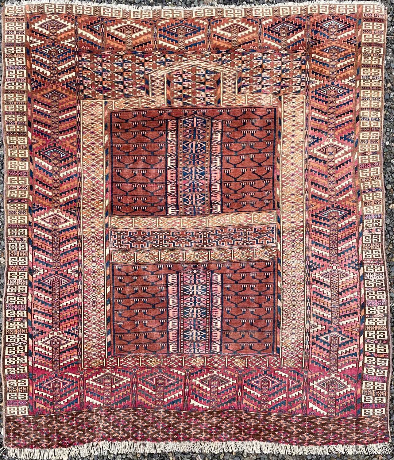 Hatchli Rug Lot 1238 - A Hatchli Turkoman rug, circa 1900, the