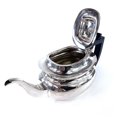 Lot 193 - A George V silver three piece tea set by...