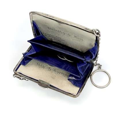 Lot 224 - Two George V silver ladies coin purses, one...