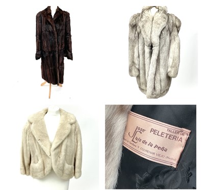 Lot 1617 - A 3/4 length silver fox fur coat by Jose Luis...