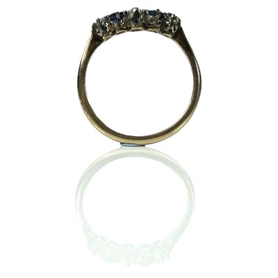 Lot 3 - An 18ct gold diamond and sapphire five stone...