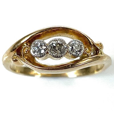 Lot 228 - An early 20th century 18ct gold three stone...