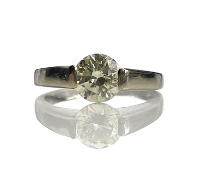 Lot 208 - An 18ct white gold diamond solitaire ring, the...