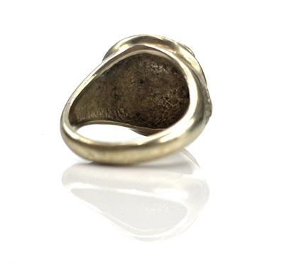 Lot 219 - A silver gilt green and brown hardstone set...