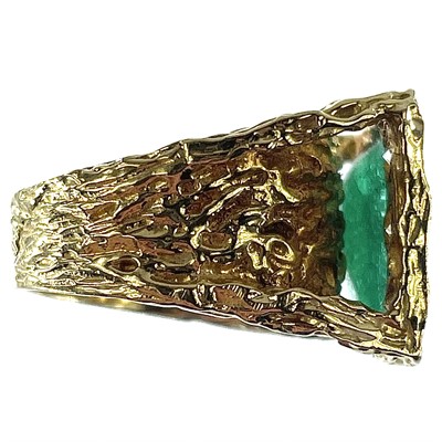 Lot 169 - A 1970's 18ct gold emerald and diamond set...