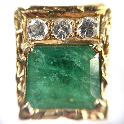 Lot 169 - A 1970's 18ct gold emerald and diamond set...