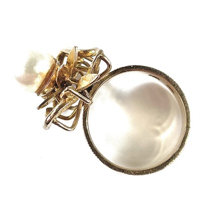 Lot 107 - A 14ct gold single pearl set ring, of foliate...