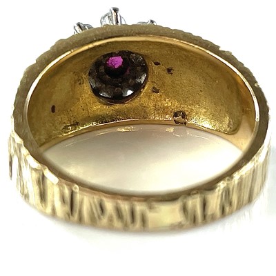 Lot 175 - A 1960's 18ct gold diamond and ruby set...