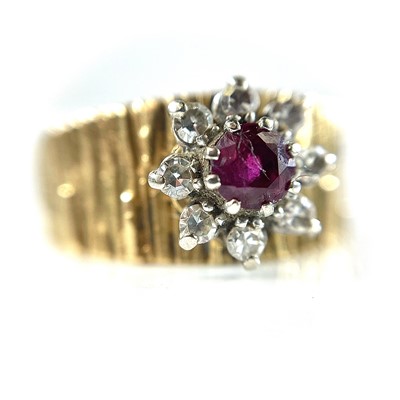 Lot 175 - A 1960's 18ct gold diamond and ruby set...
