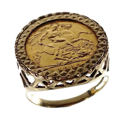 Lot 114 - A 1982 half sovereign coin 9ct mounted ring,...