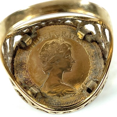 Lot 114 - A 1982 half sovereign coin 9ct mounted ring,...