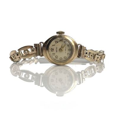 Lot 383 - A Smiths 9ct ladies manual wind wristwatch...