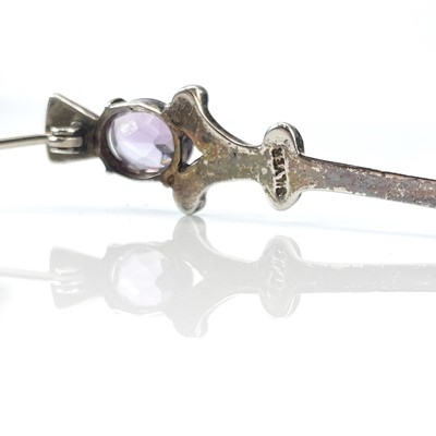 Lot 210 - Two Scottish silver brooches set with amethyst,...