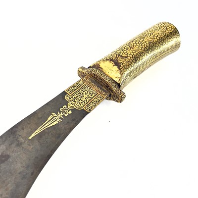 Lot 1020 - An Indian gold damascened steel kukri, early...