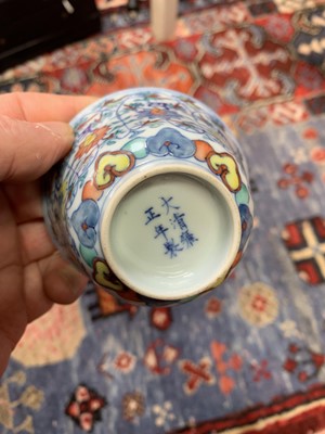 Lot 18 - A Chinese Doucai porcelain tea bowl, 18th...