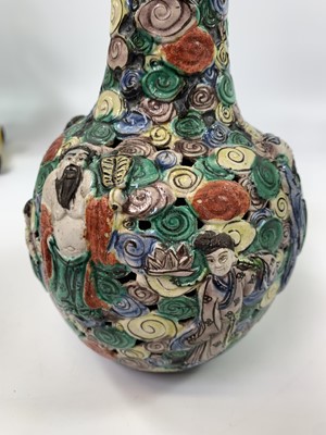 Lot 8 - A Chinese famille verte reticulated bottle...