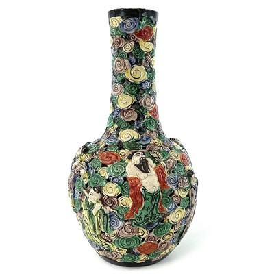 Lot 8 - A Chinese famille verte reticulated bottle...