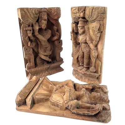 Lot 296 - Three carved wood panels of deities, early-mid...