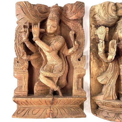 Lot 296 - Three carved wood panels of deities, early-mid...