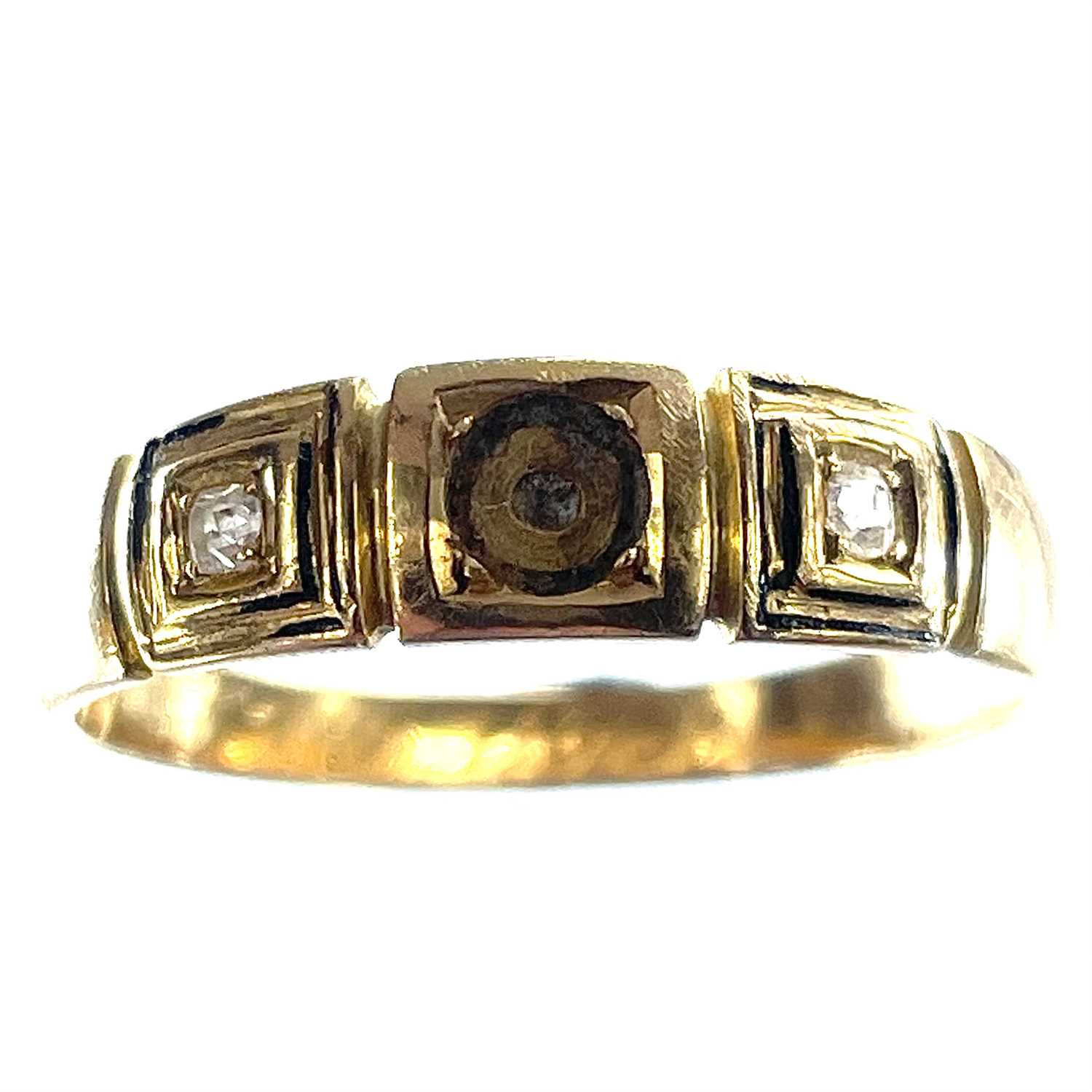 Lot 59 - A Victorian 18ct gold ring set with two small...