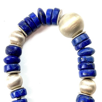 Lot 283 - A contemporary lapis lazuli and silver bead...