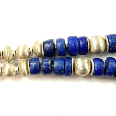 Lot 283 - A contemporary lapis lazuli and silver bead...