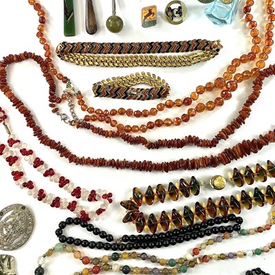 Lot 248 - A collection of costume jewellery including...