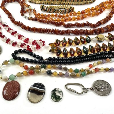 Lot 248 - A collection of costume jewellery including...
