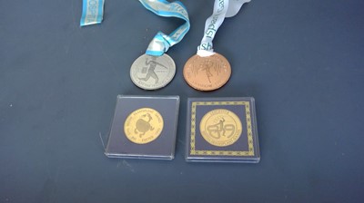 Lot 7 - Four 'The British Transplant Games' Medals,...