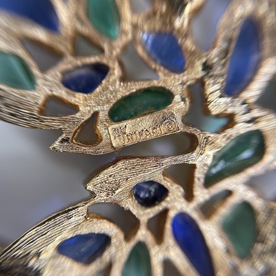 Lot 270 - A gilt metal and enamel leaf shaped brooch by...