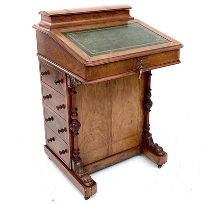 Lot 1847 - A Victorian walnut and inlaid Davenport, with...