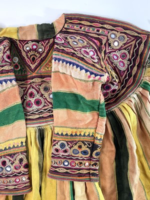 Lot 1221 - Eight Uzbekistan textiles to include two coats...