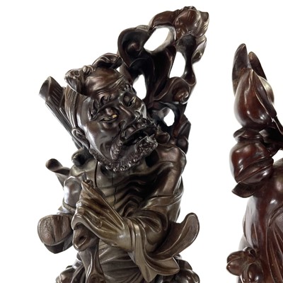 Lot 128 - A pair of Chinese carved hardwood figures,...
