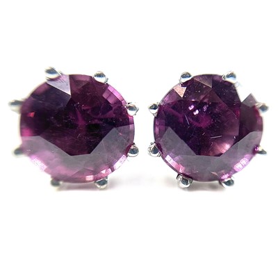Lot 65 - A pair of 18ct (tested) white gold pink...